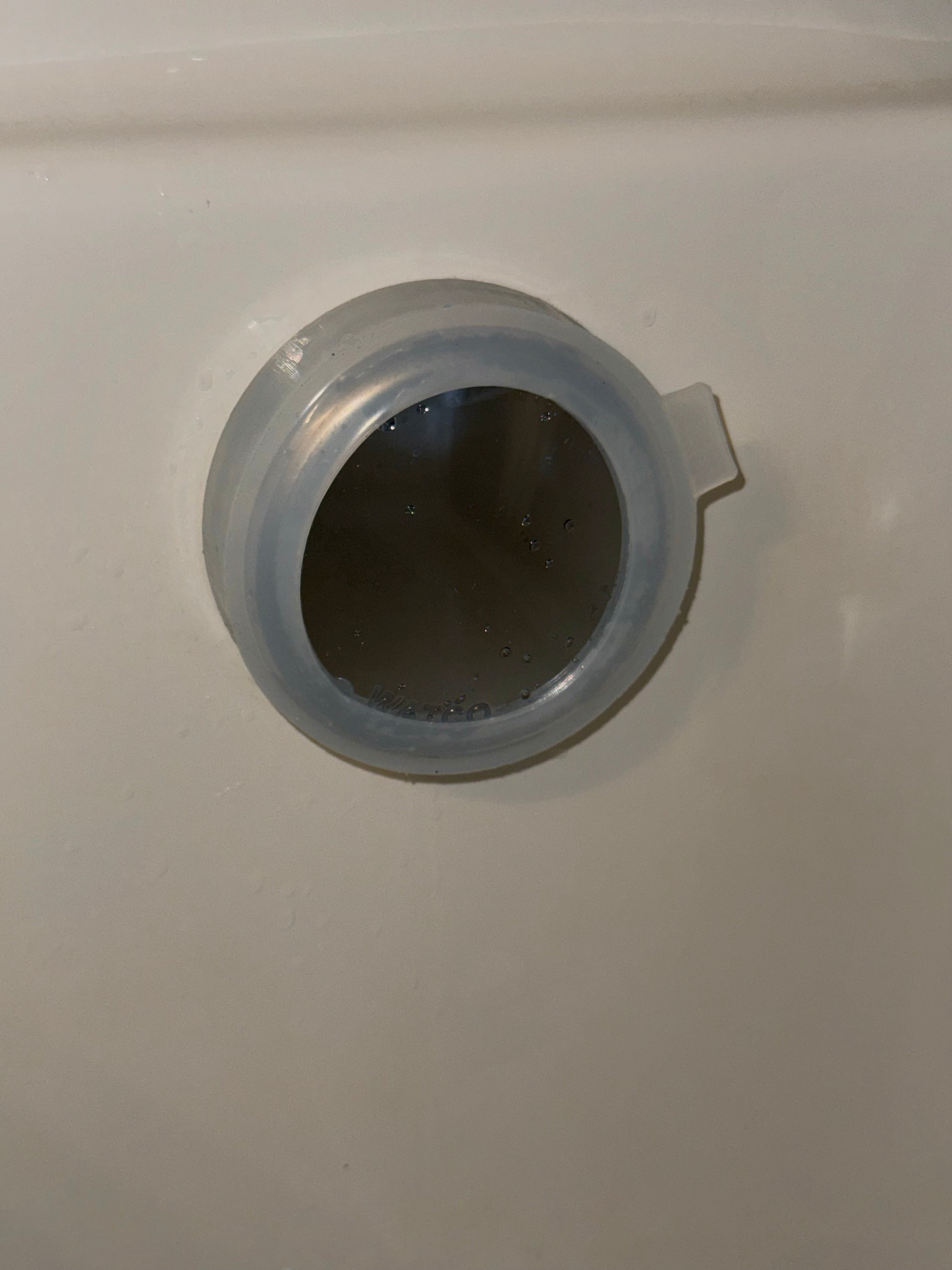 Tub Tie™ Overflow Drain Cover